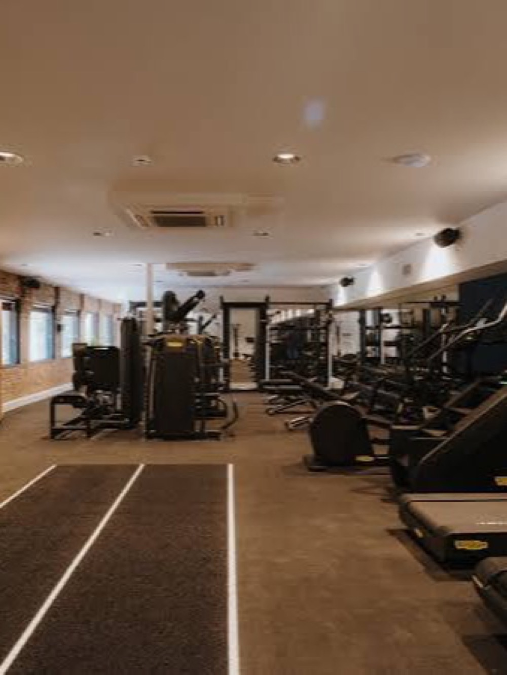 Fitness centre with running track and strength equipment – Wellness gym