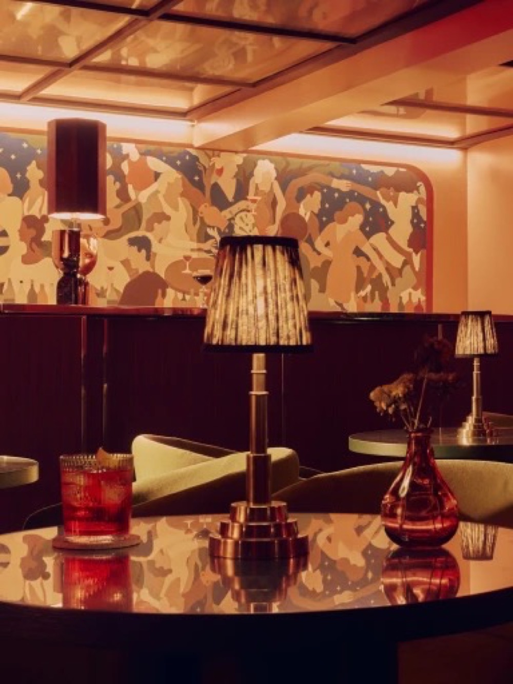 Evening drinks in the mural-lined cocktail lounge – Crafted bar